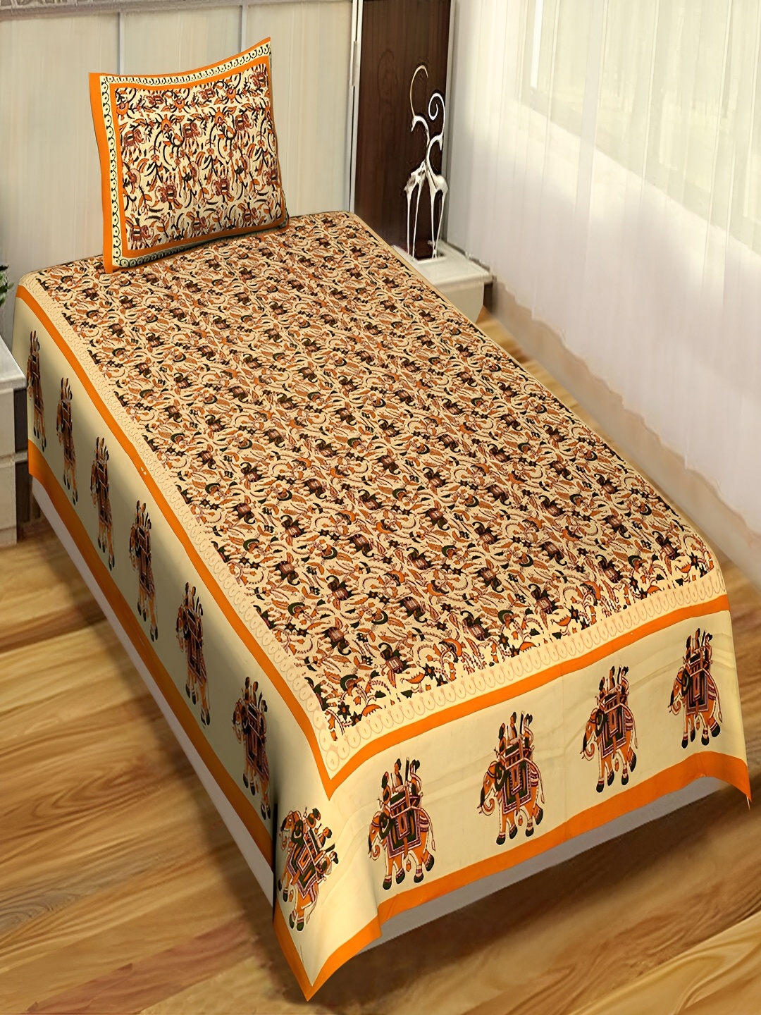 

Aura Yellow & Orange Ethnic Motifs Single Bedsheet With 2 Pillow Covers