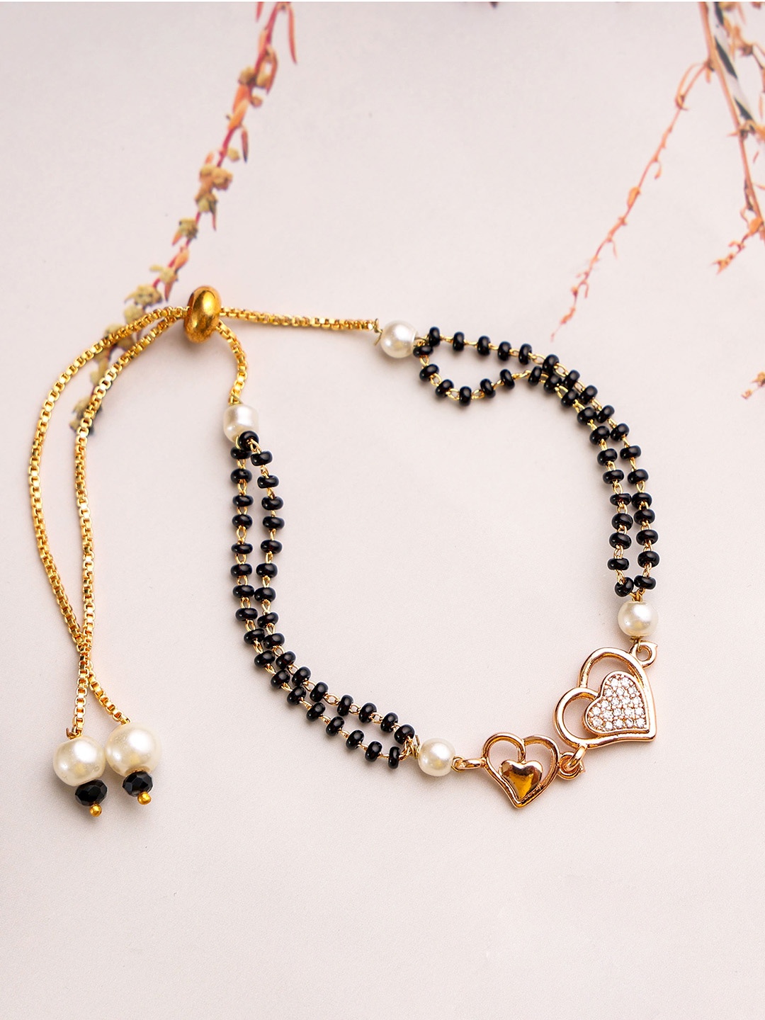 

Mali Fionna Gold-Plated Artificial Stones and Beads Mangalsutra Bracelet