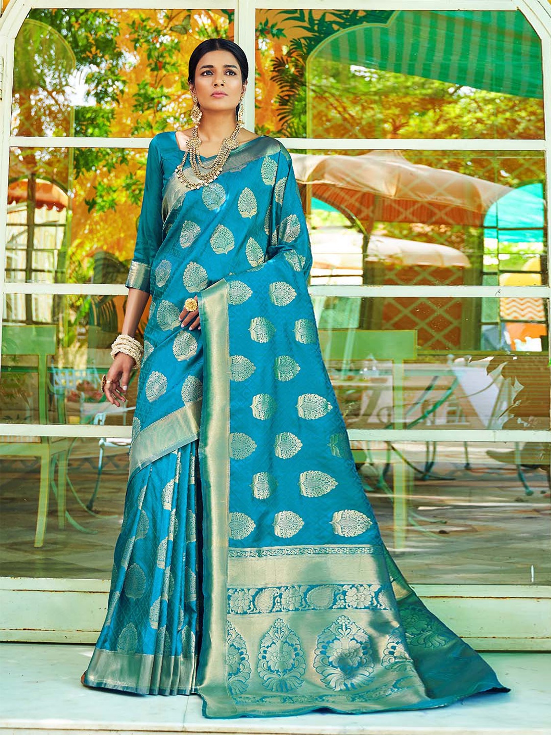 

DEVATITHI Woven Design Zari Silk Blend Banarasi Saree, Blue