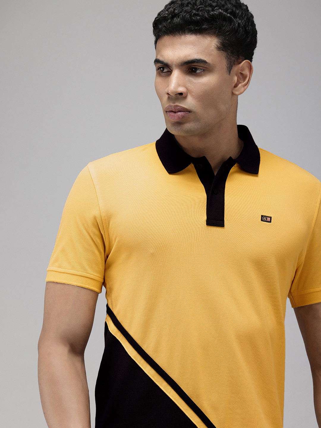 

Arrow Pure Cotton Colourblocked Polo Collar T-shirt, Yellow