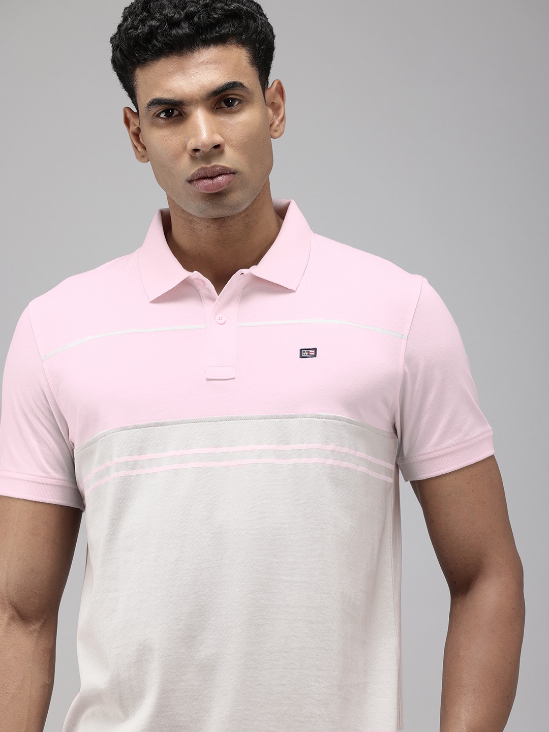 

Arrow Men Colourblocked Polo Collar T-shirt, Pink