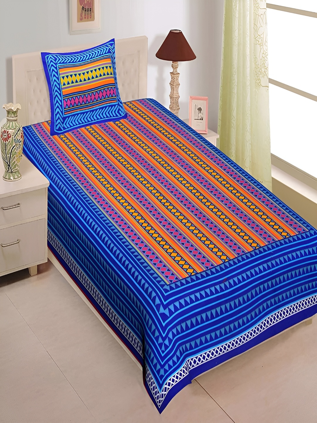 

Aura Blue & Orange Geometric 120 TC Pure Cotton Single Bedsheet with 1 Pillow Cover