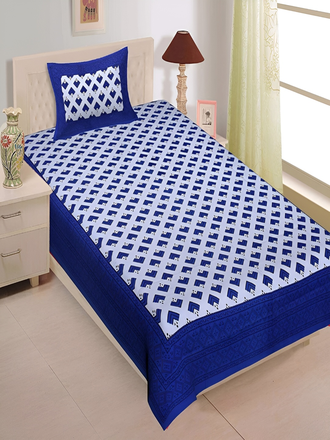 

Aura Blue & White Geometric Cotton 120 TC Single Bedsheet with 2 Pillow Covers