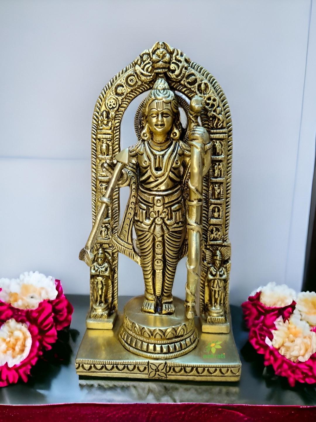 

Aakrati Gold Toned Brass Ram Lalla Statue Showpiece