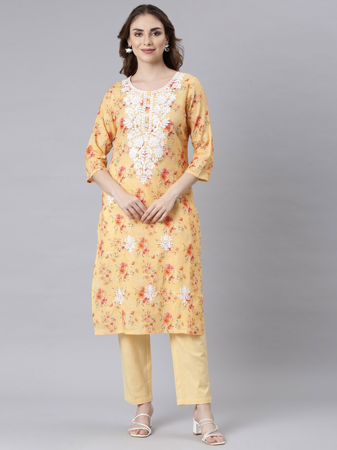 

Neerus Floral Printed Round Neck Thread Work Straight Kurta With Trousers, Yellow