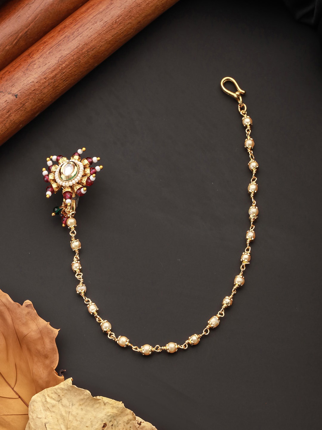 

Jazz and Sizzle Gold-Plated Kundan Chained Nosepin