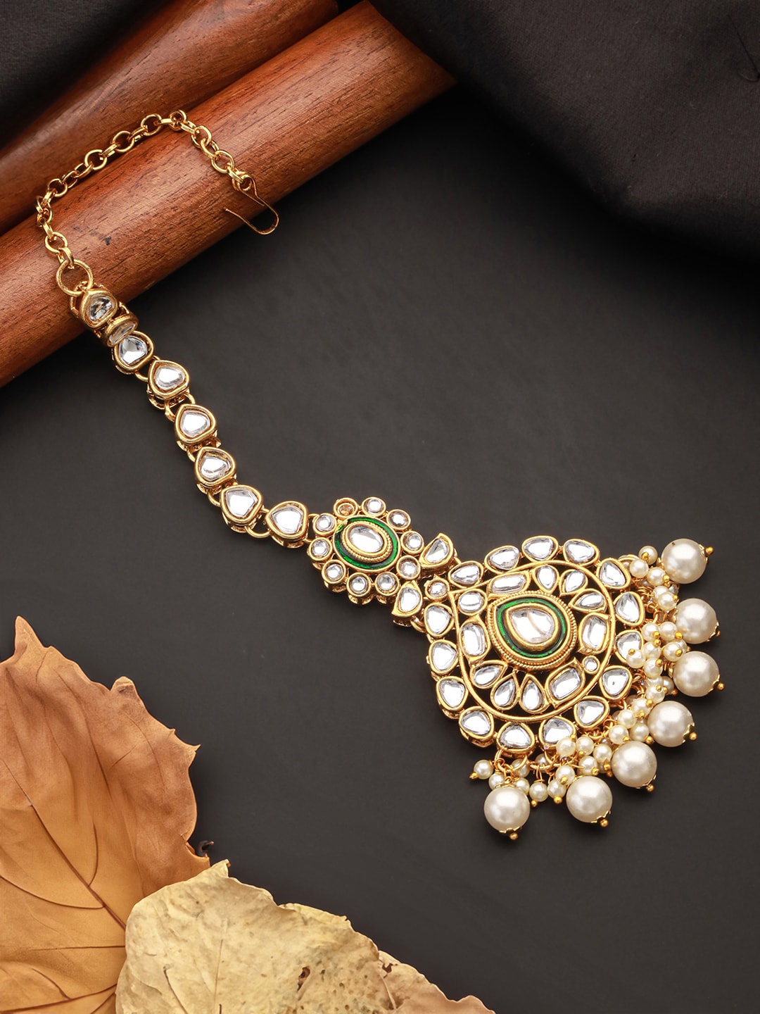 

Jazz and Sizzle Gold-Plated Kundan Studded Maang Tikka Head Jewellery