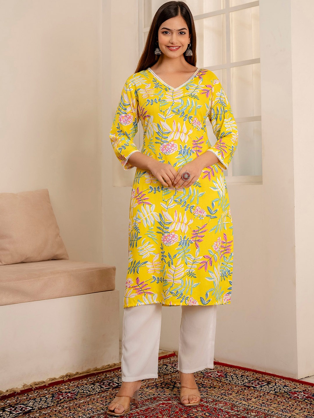 

Veshviti Women Floral Printed Regular Thread Work Liva Kurta with Trousers, Yellow