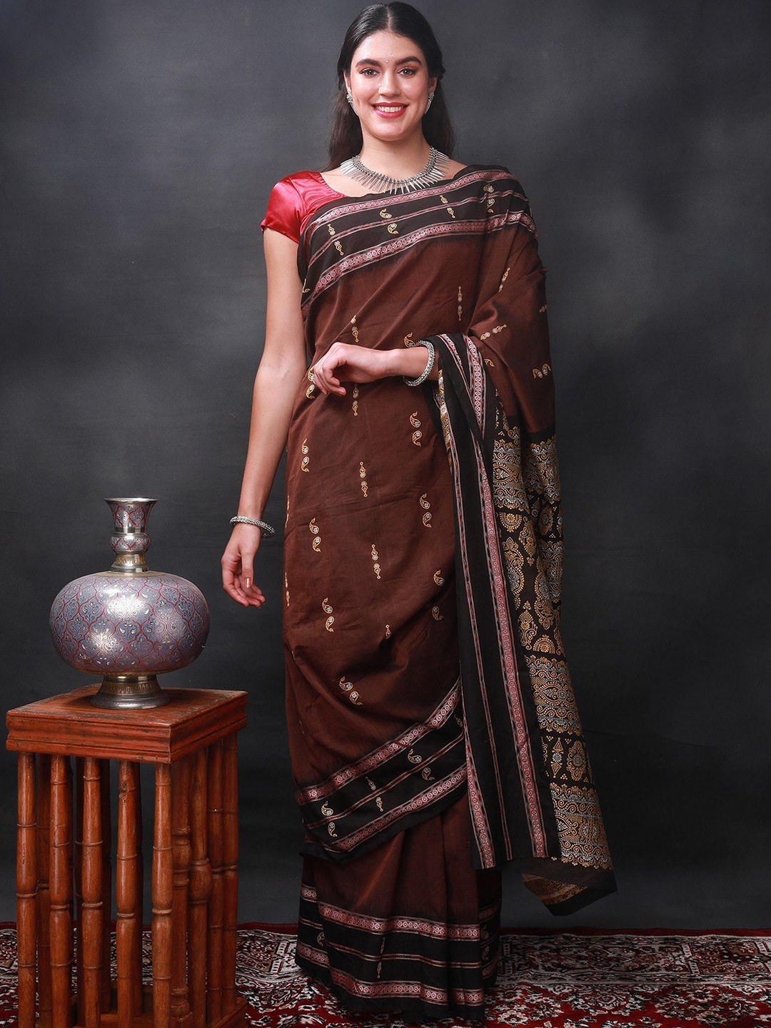 

Exotic India Deep Mahogany Pure Cotton Bomkai Saree with Woven Bootis Pattern, Brown