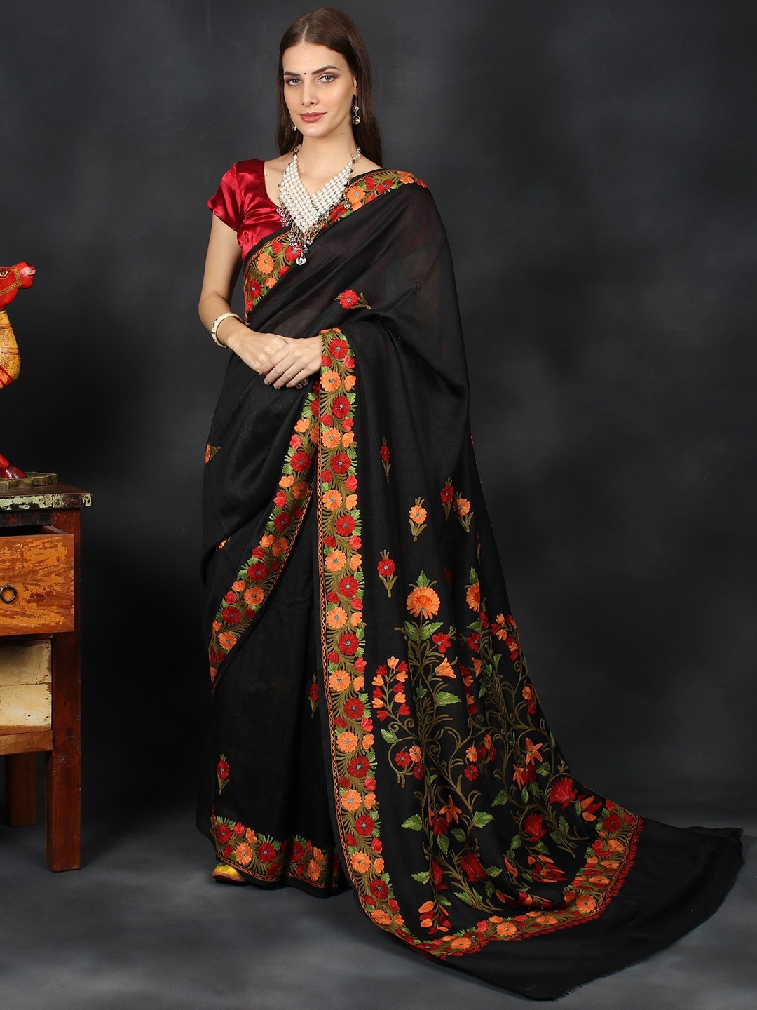 

Exotic India Ethnic Motifs Embroidered Pure Georgette Saree, Black