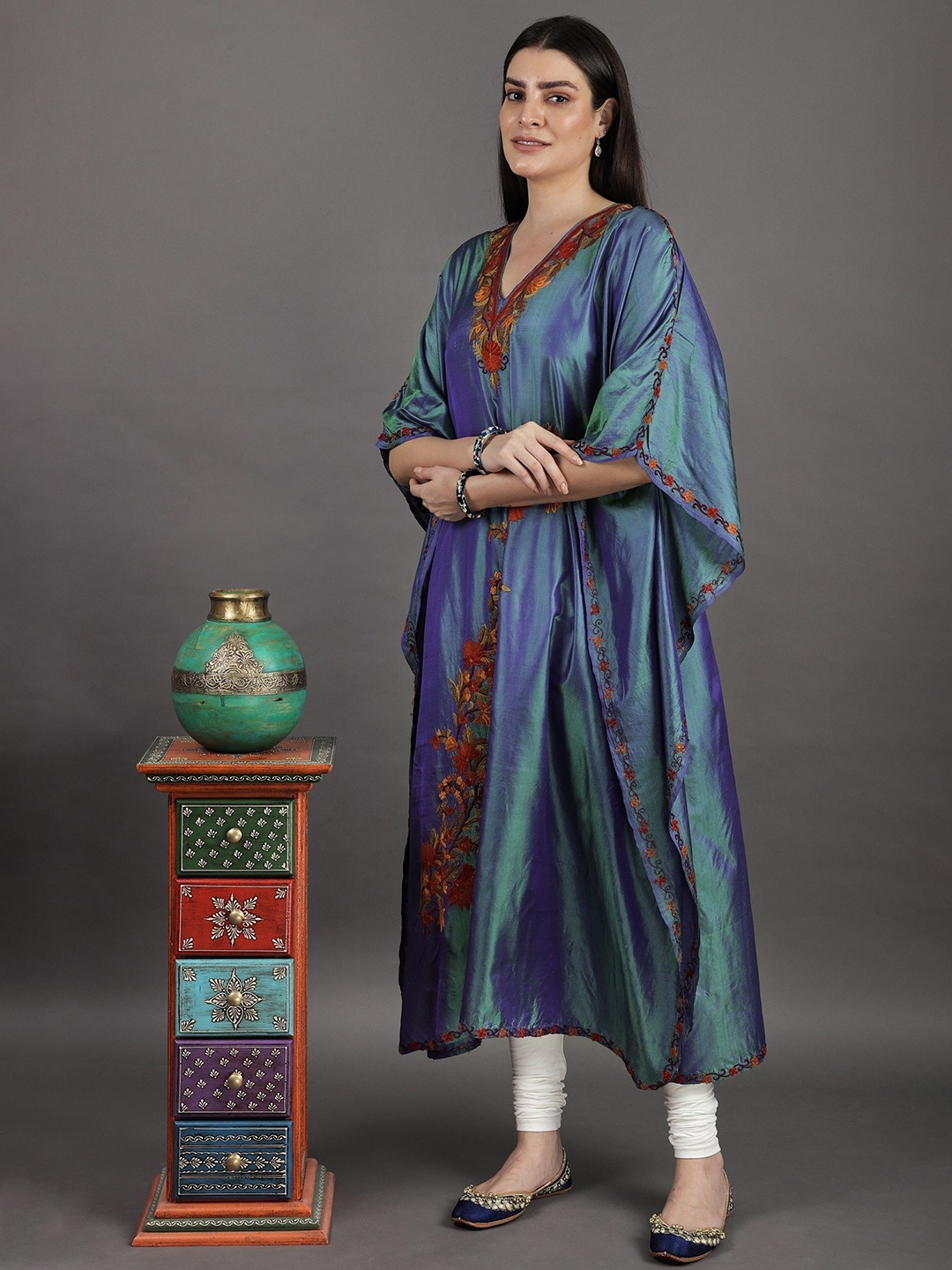 

Exotic India Dazzling Blue Two-Tone Long Kashmiri Kaftan with Floral Aari Embroidery