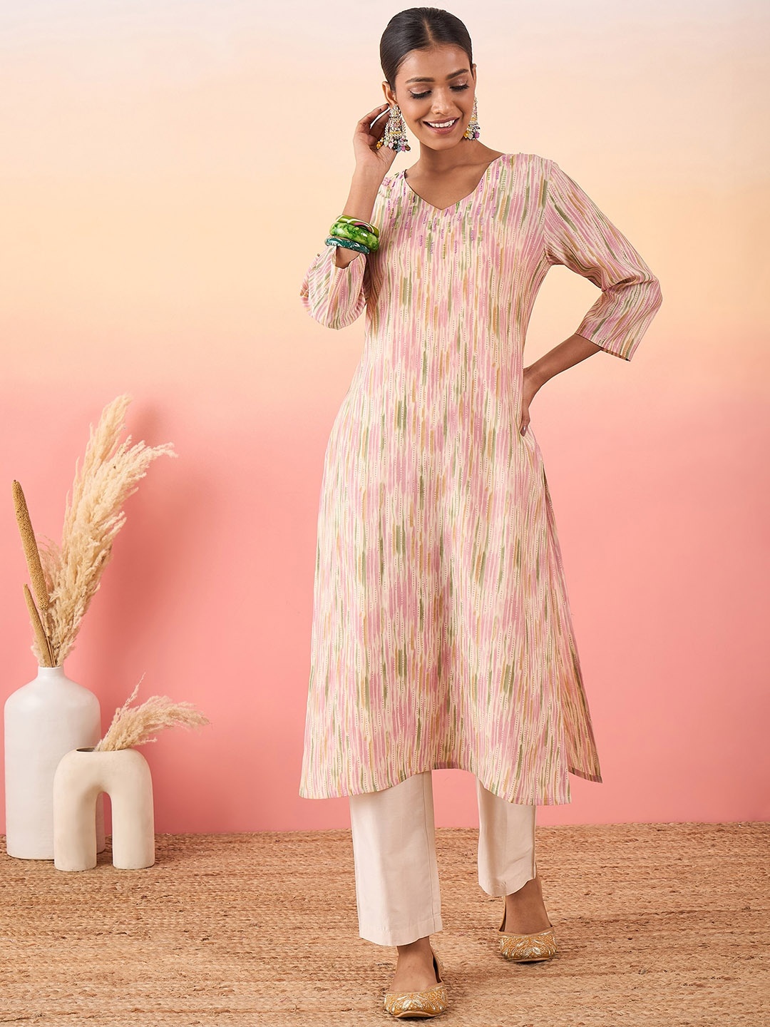 

Madhuni Geometric Printed Beads and Stones Chanderi Silk Straight Kurta with Palazzos, Cream
