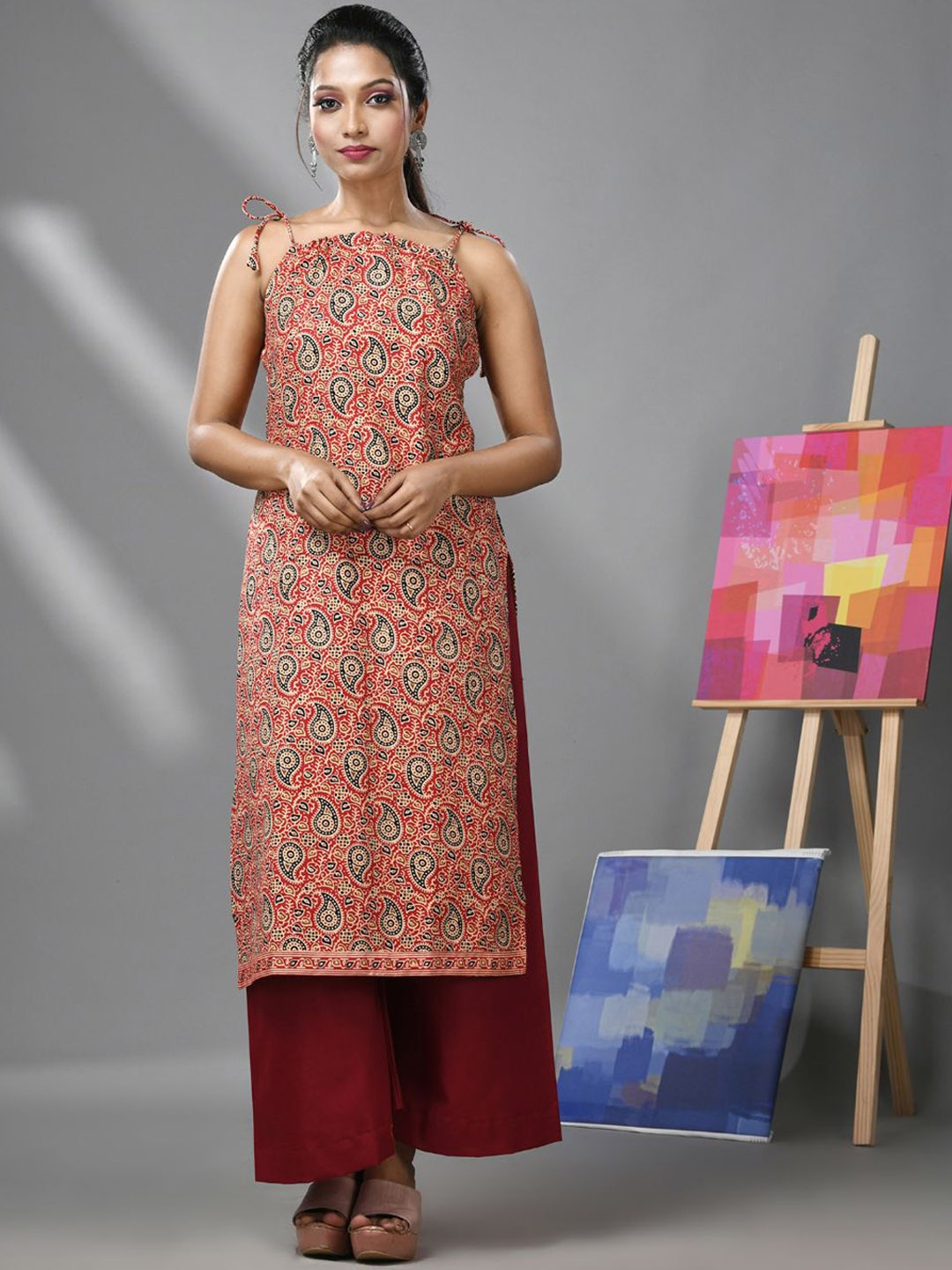 

Charukriti Ethnic Motifs Printed Shoulder Straps Cotton A-Line Kurta, Red