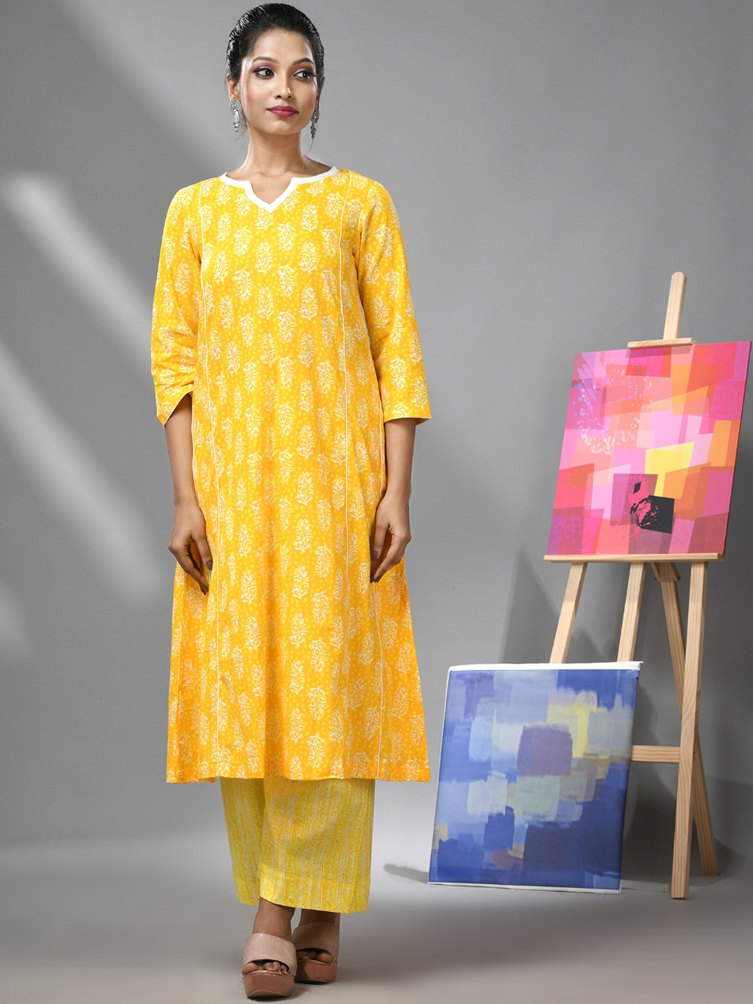 

Charukriti Ethnic Motifs Printed Cotton A-Line Kurta, Yellow