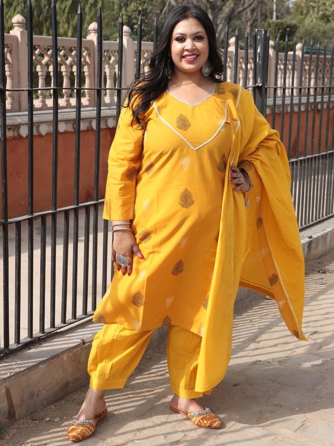 

Swadeshi Shringaar Printed Pure Cotton V-Neck Kurta Set, Yellow