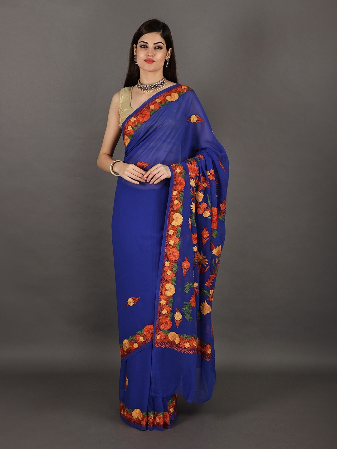 

Exotic India Floral Embroidered Pure Georgette Saree, Blue
