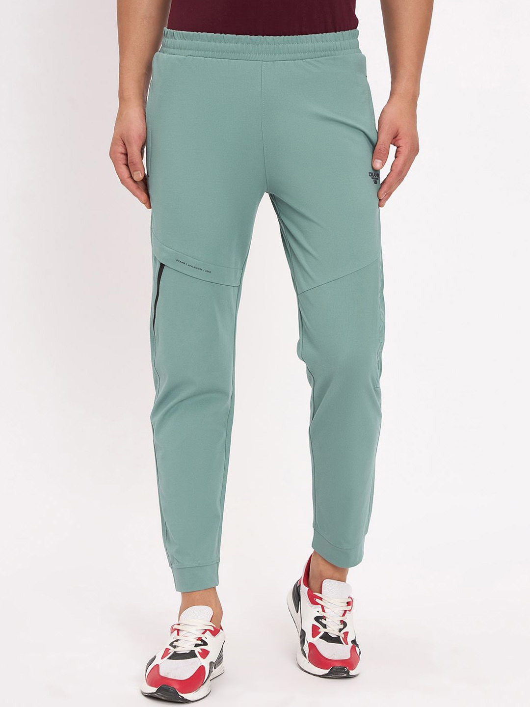 

Okane Men Mid Rise Regular Fit Joggers, Green