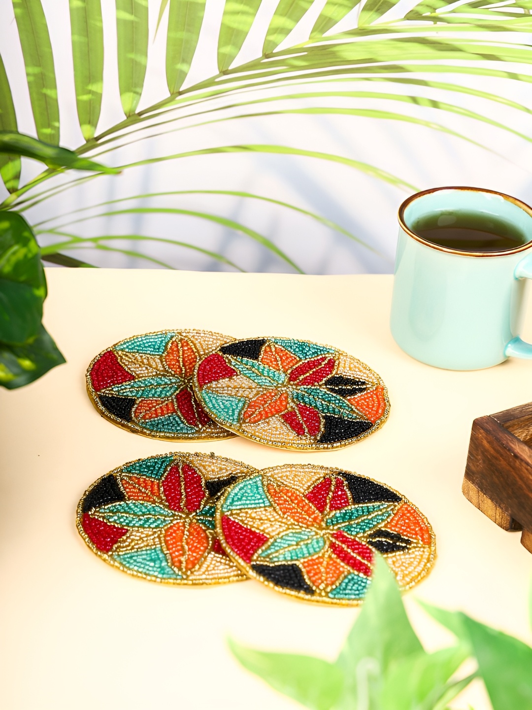 

Aditya Impex 4-Pcs Cream & Red Embellished Round Coasters