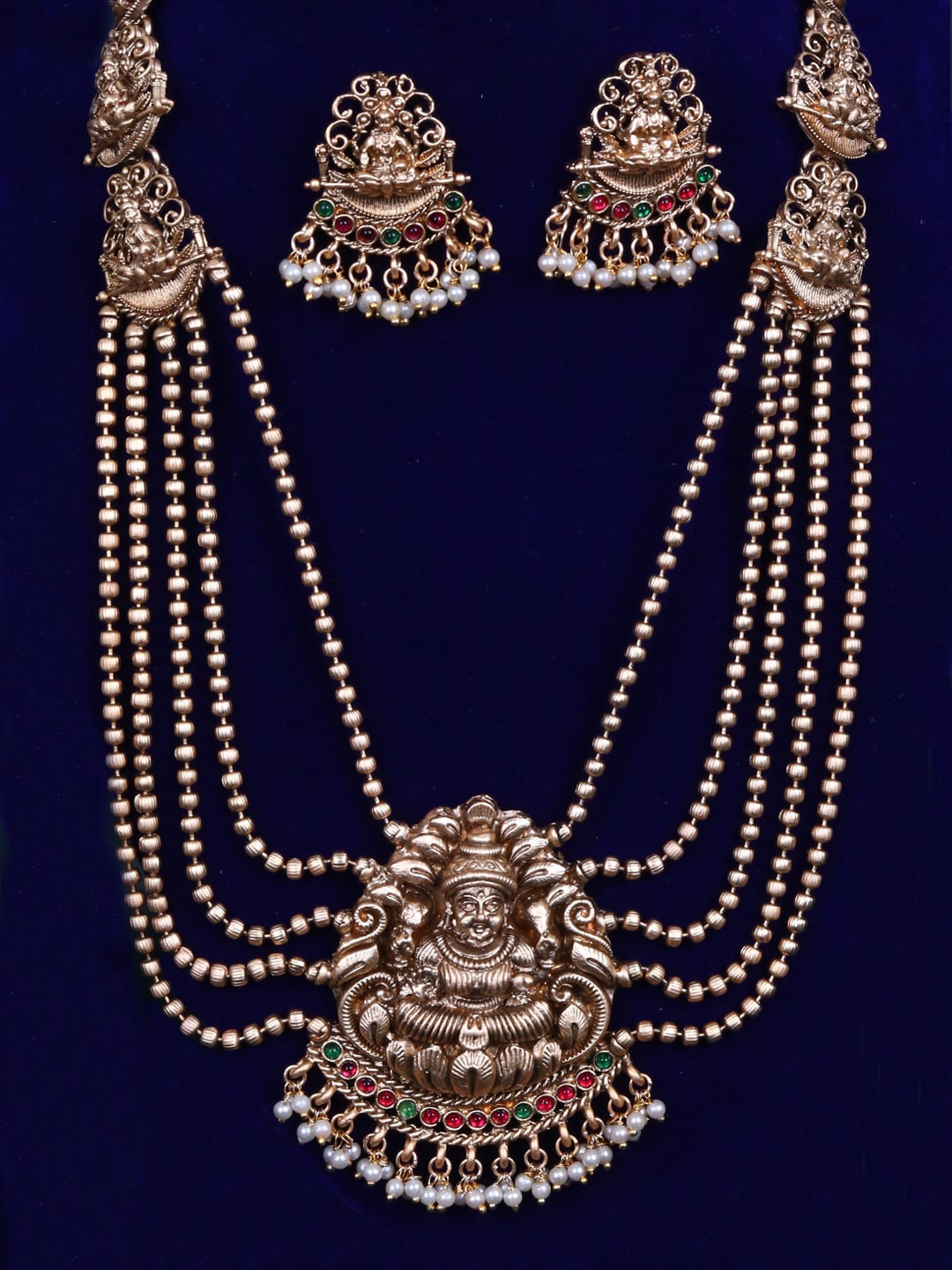 

Adwitiya Collection Gold-Plated Stones Studded & Perl Beaded Laxmi Layered Jewellery Set