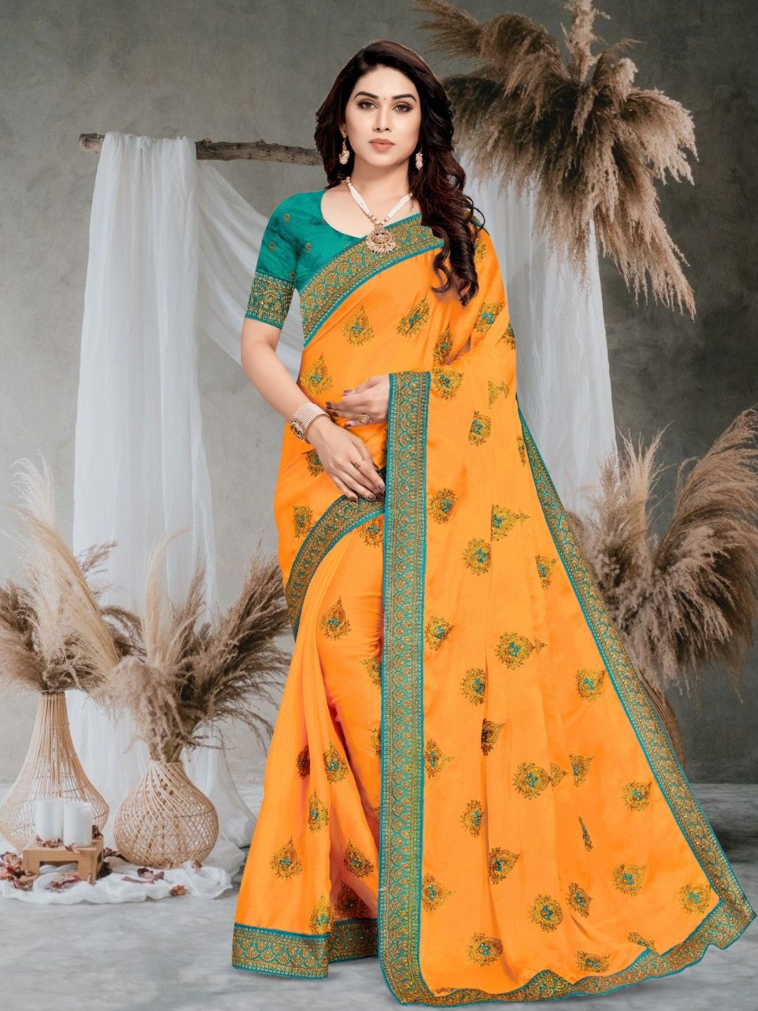

Mitera Ethnic Motifs Embroidered Silk Blend Heavy Work Saree, Yellow