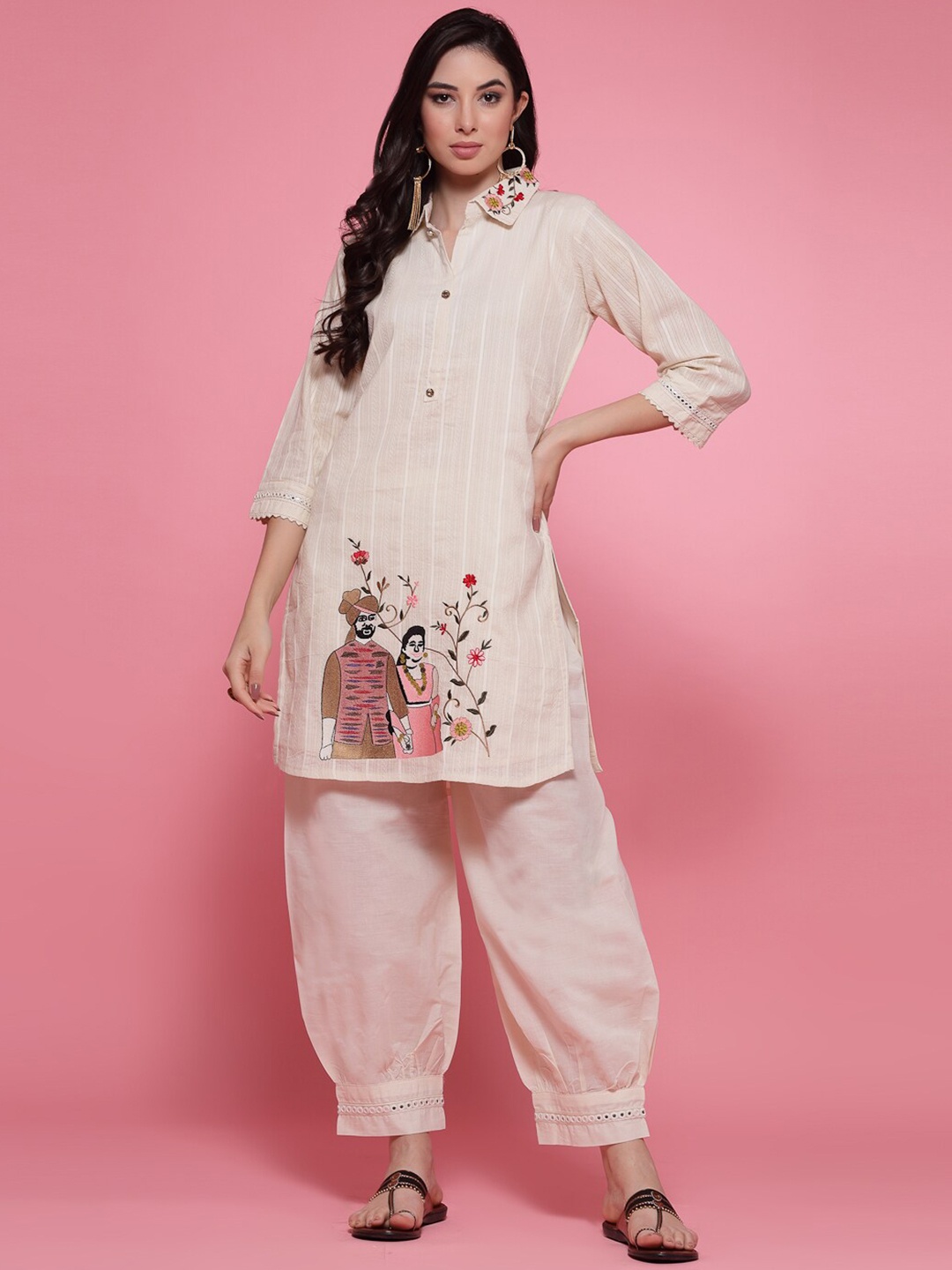 

Clora Creation Women Embroidered Printed Collar Neck Tunic With Solid Pants Co-Ords, Off white