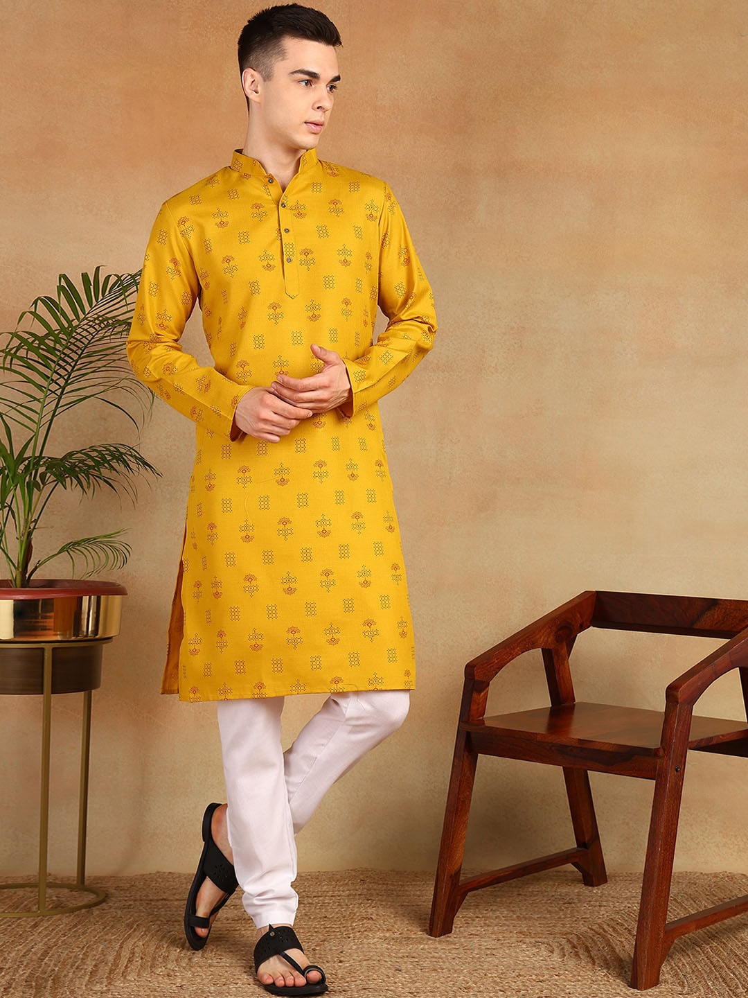 

Anouk Ethnic Motifs Printed Mandarin Collar Thread Work Kurta, Yellow