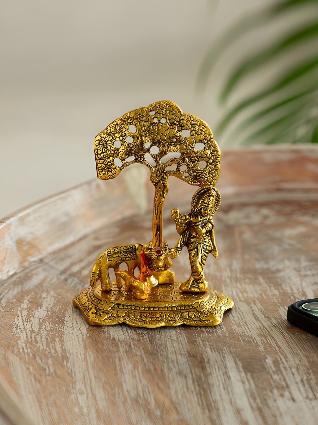 

ExclusiveLane Gold Toned Krishna & Cow Idol Decorative Showpiece Figurine