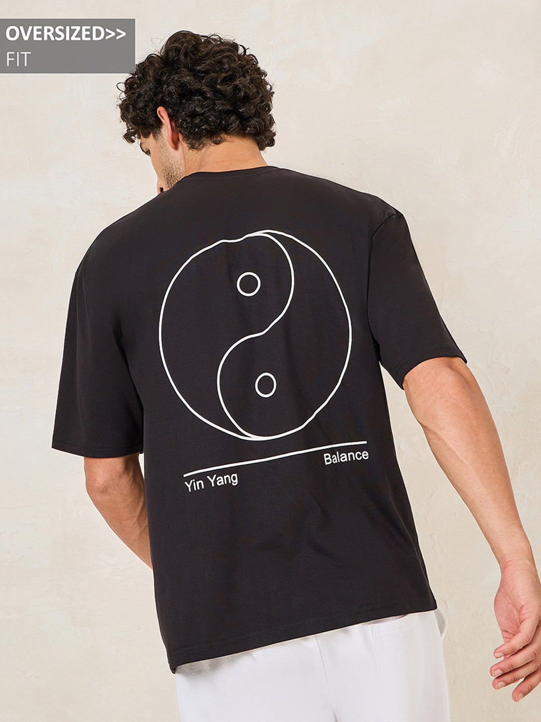 

Styli Men Back Printed Oversized Cotton Rich Tee, Black