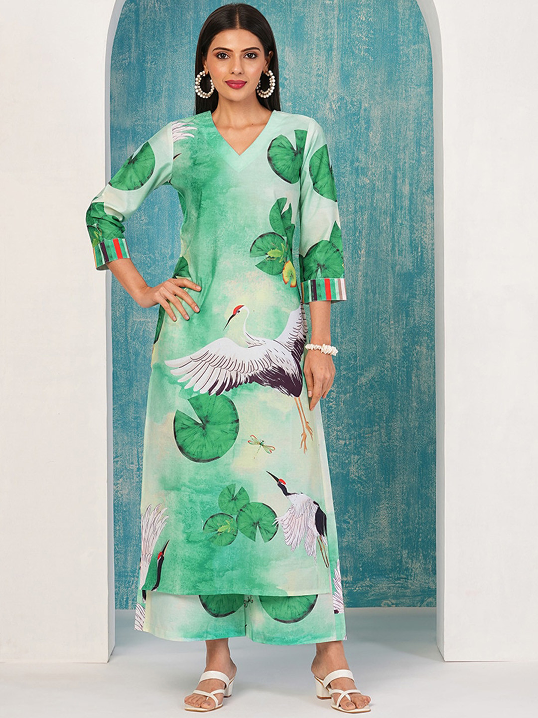 

Anni Designer Women Floral Printed Regular Kurta with Palazzos, Sea green