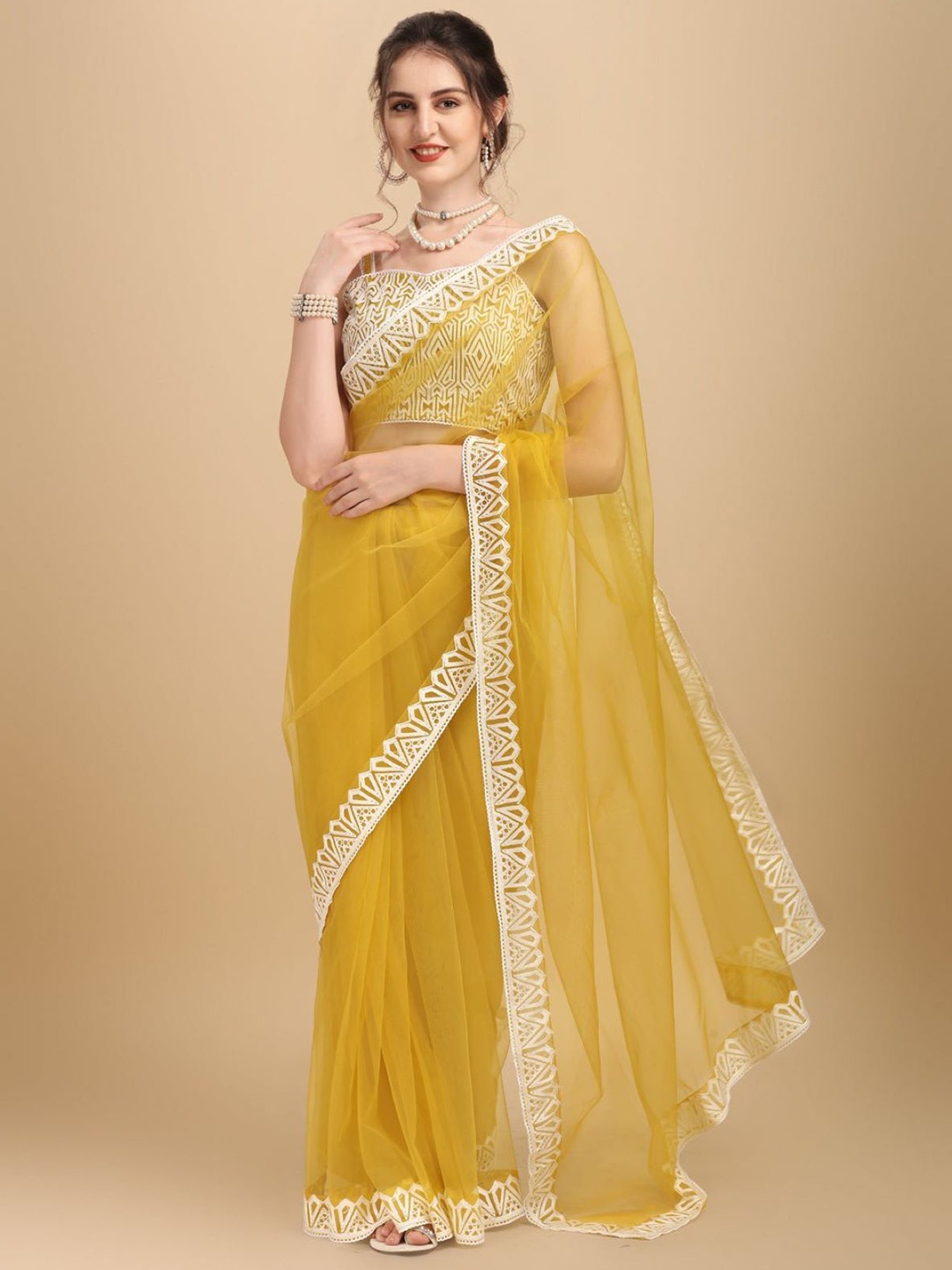 

VAANI CREATION Embroidered Sequinned Net Saree, Mustard