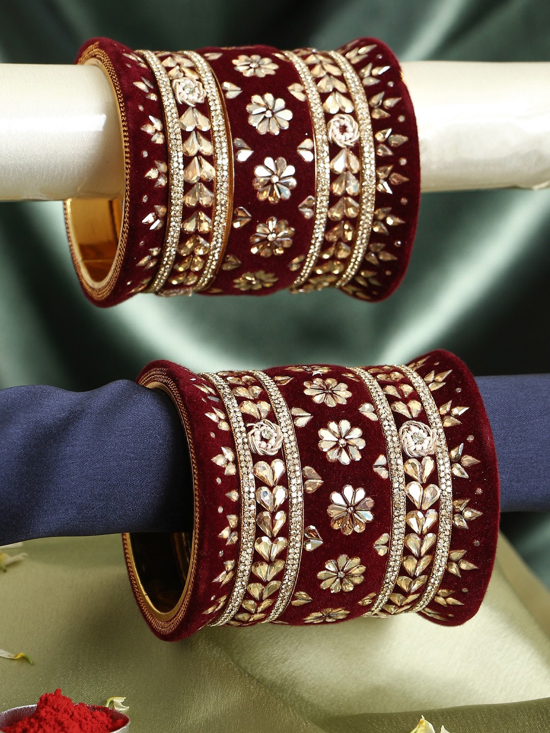 

Adwitiya Collection Set Of 18 Gold Plated Stone Studded Velvet Bangles