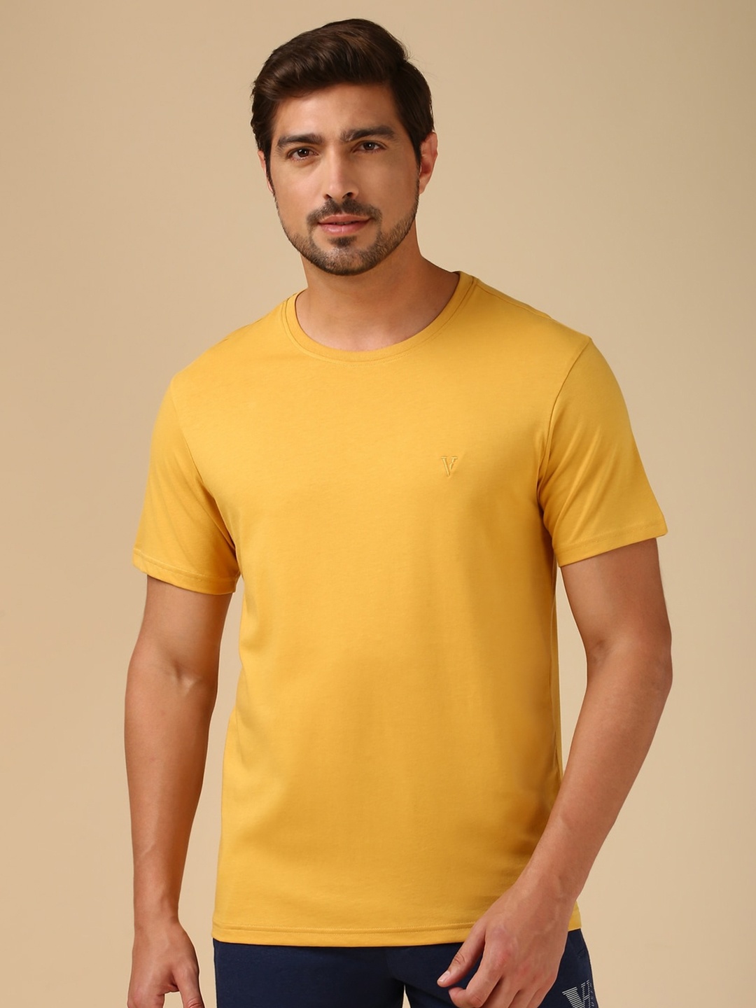 

Van Heusen Men Athleisure Solid Crew Neck Raw Edge T-shirt, Yellow