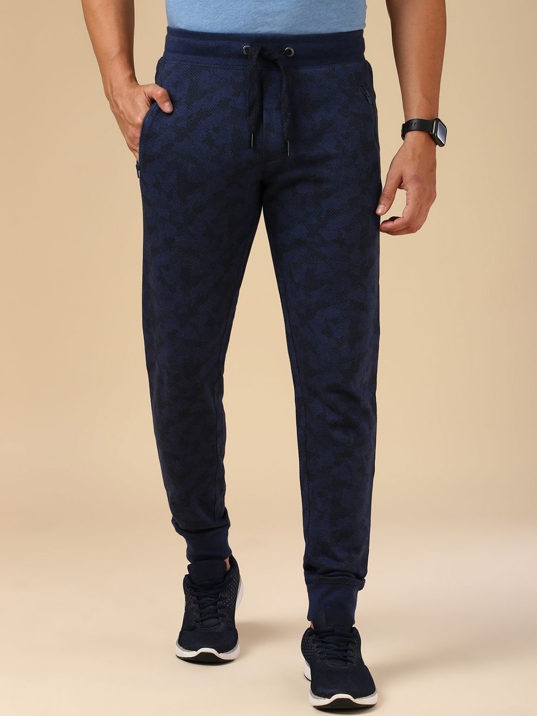 

Van Heusen Men Printed Cotton Mid Rise Joggers, Blue