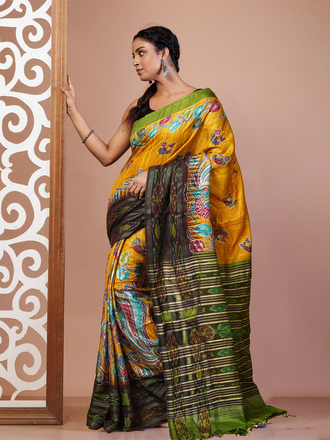 

Unnati Silks Ethnic Motifs Pure Silk Handloom Tussar Saree, Yellow