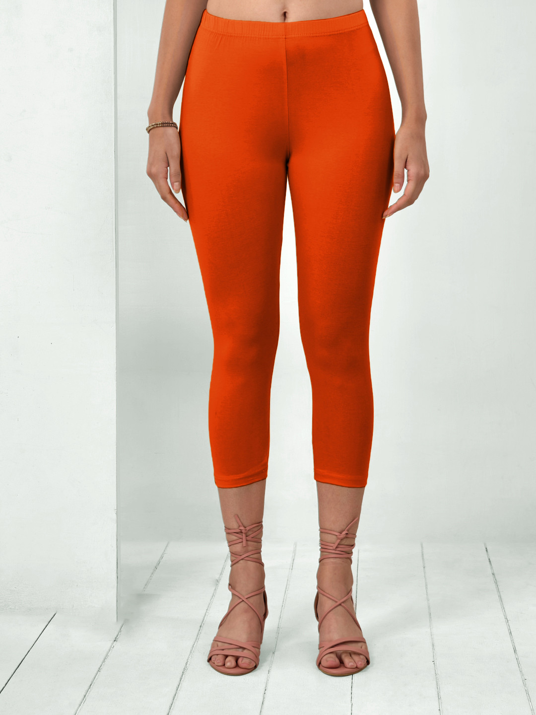 

LYRA Women Solid Mid-Rise Capris, Orange