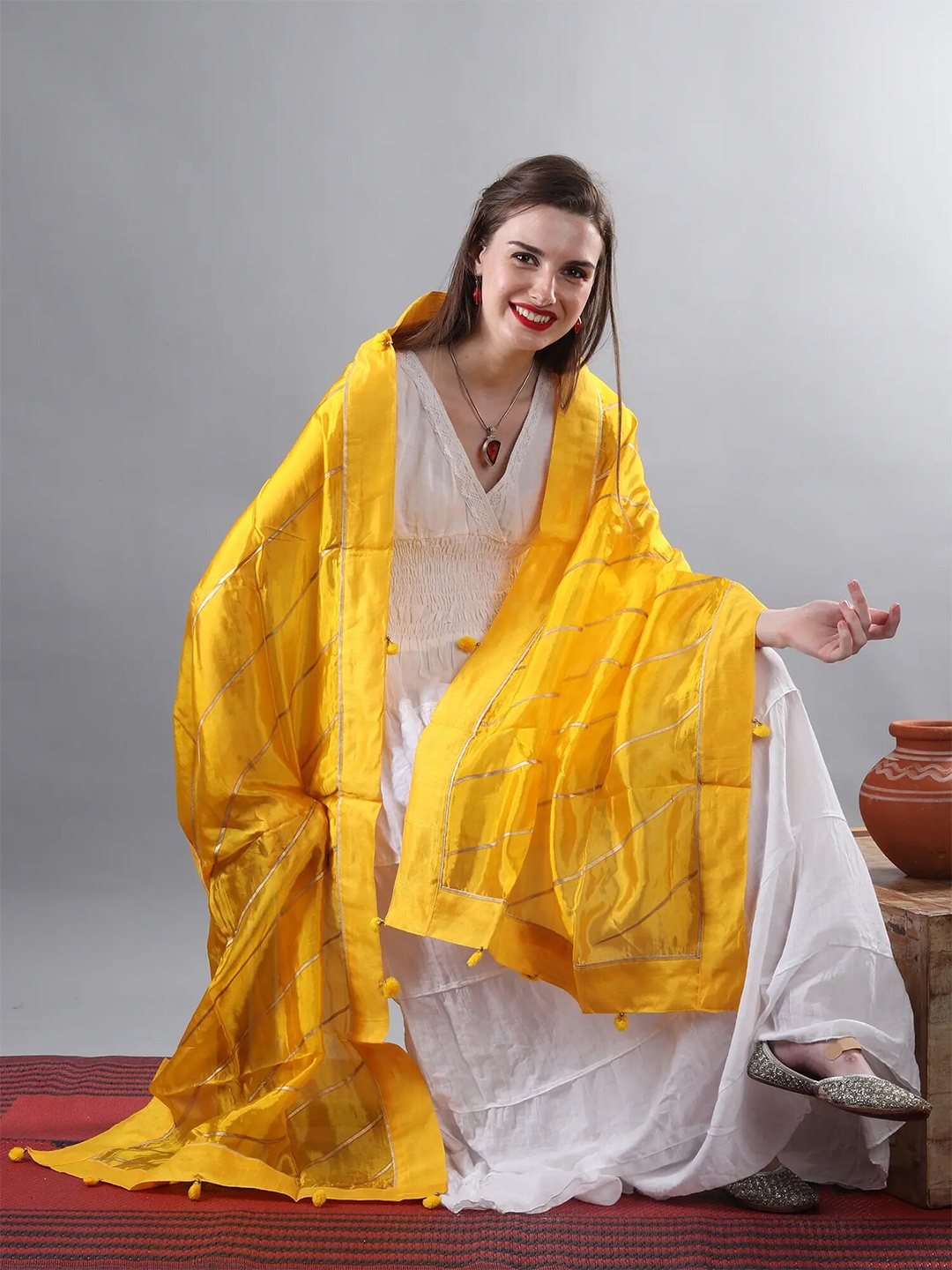 

Exotic India Mustard Yellow Gota Silk Dupatta with Patch Border and Pom-Poms