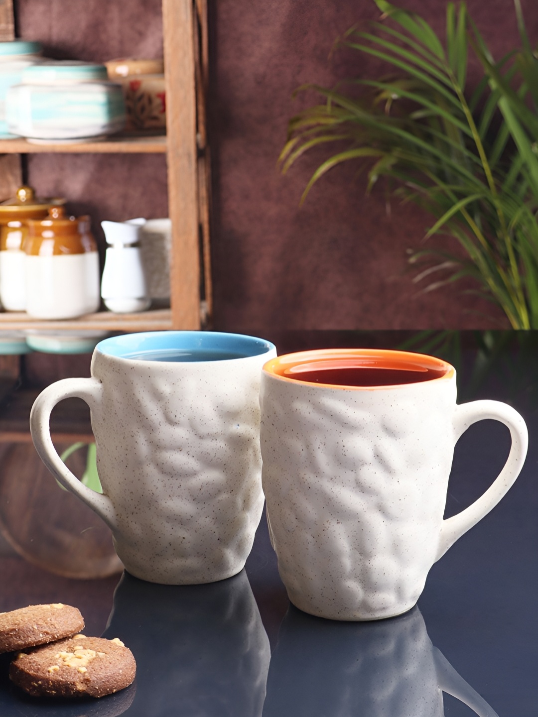 

Aura White & Orange 2 Pieces Textured Ceramic Glossy Mugs 250 ml each