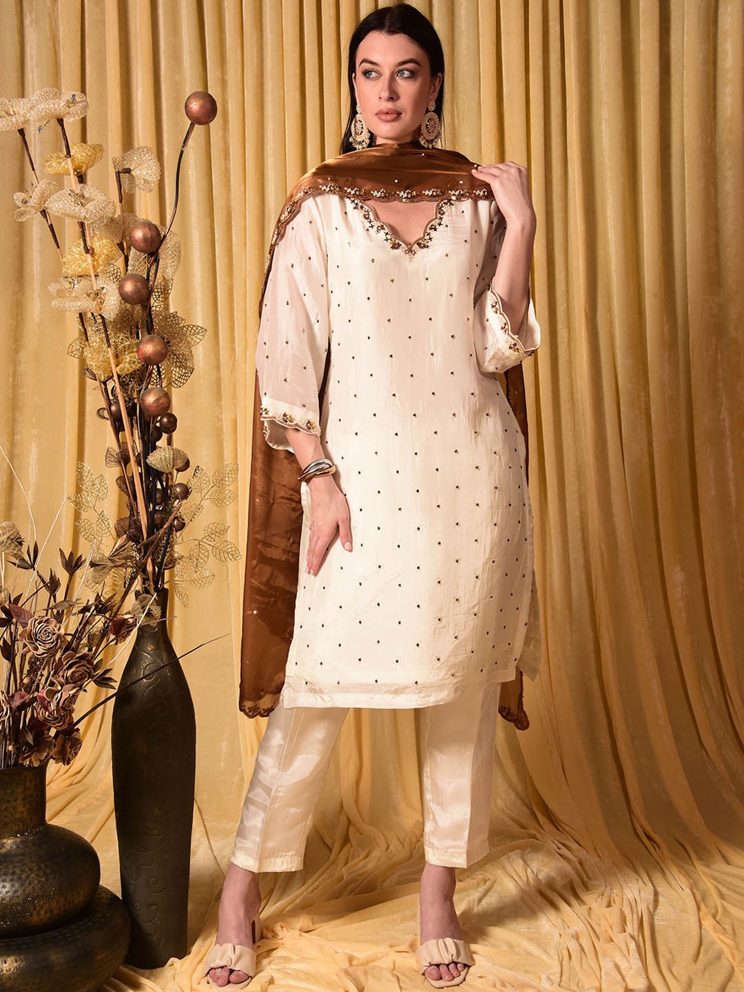 

Laalzari Women Ethnic Motifs Regular Beads and Stones Silk Crepe Kurta with Trousers & With Dupatta, Off white