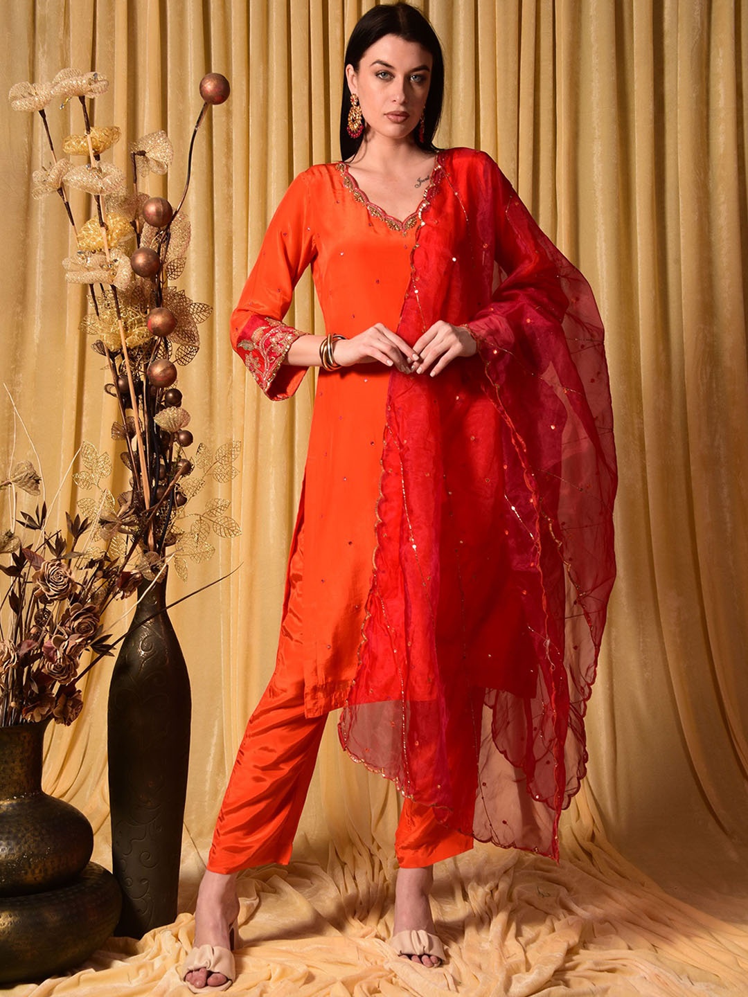 

Laalzari Women Ethnic Motifs Embroidered Regular Beads and Stones Kurta with Trousers & With Dupatta, Orange