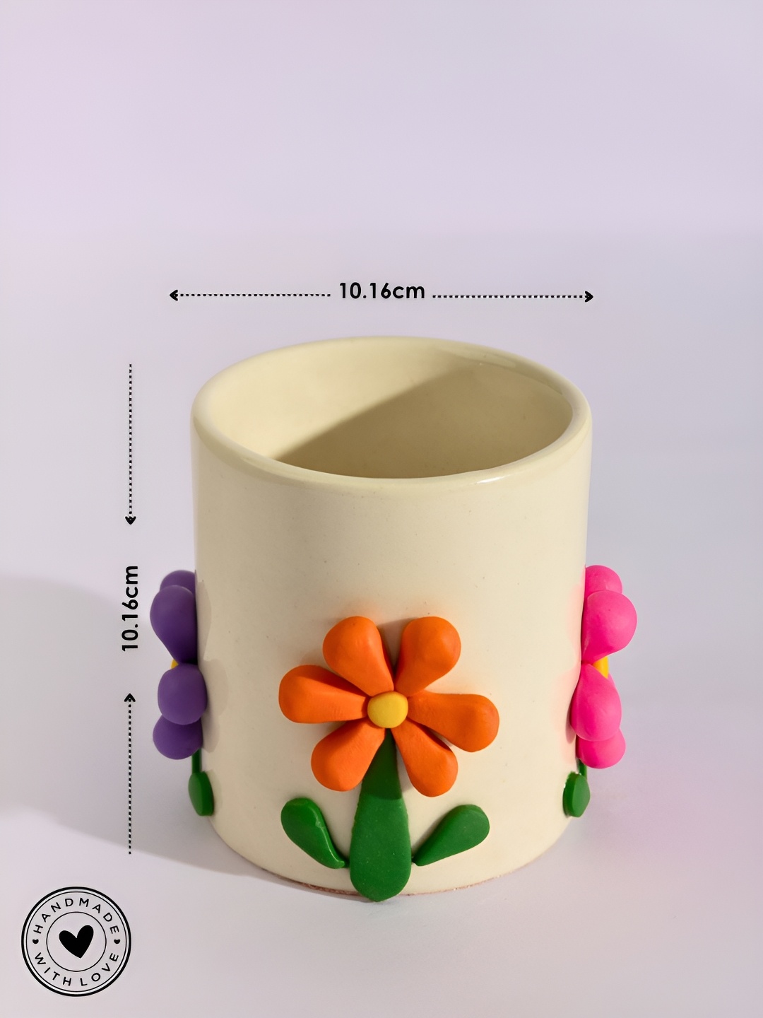 

Indikluster Cream Textured Ceramic Planter
