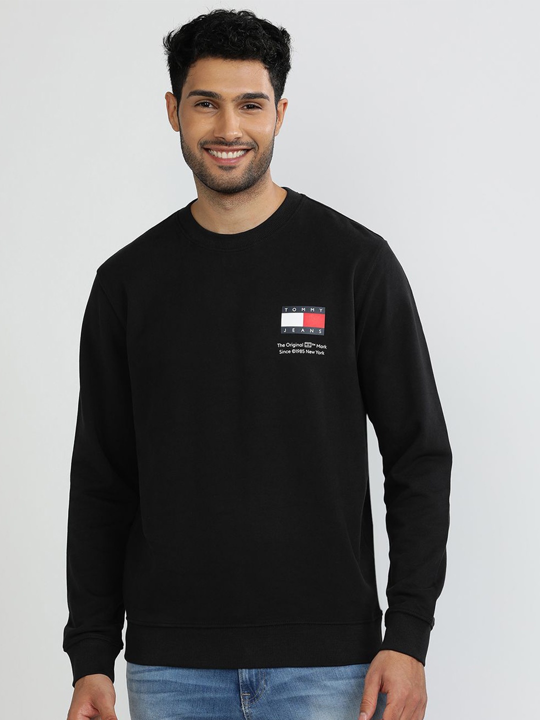 

Tommy Hilfiger Men Round Neck Solid Sweatshirt, Black