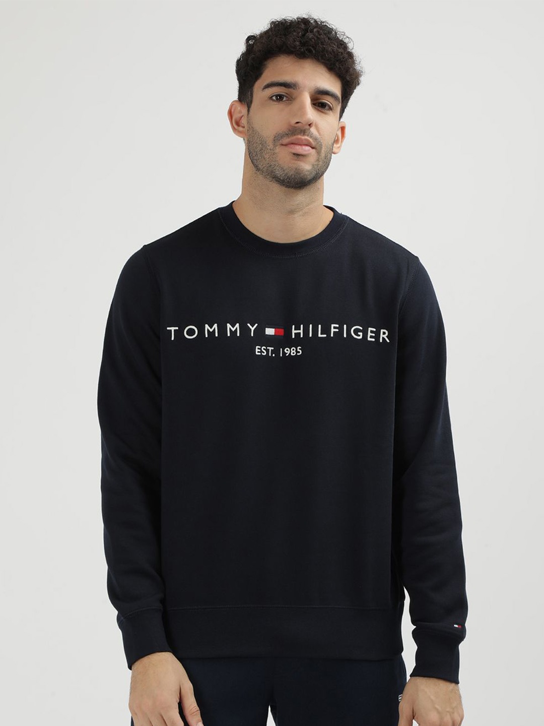 

Tommy Hilfiger Men Solid Round Neck Sweatshirt, Blue