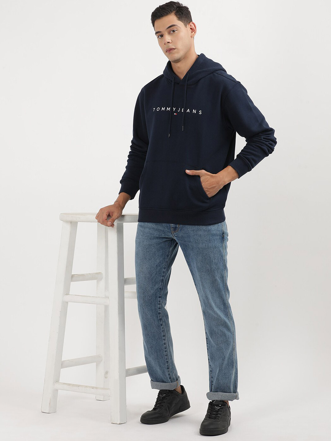

Tommy Hilfiger Men Printed Solid Hooded Sweatshirt, Blue