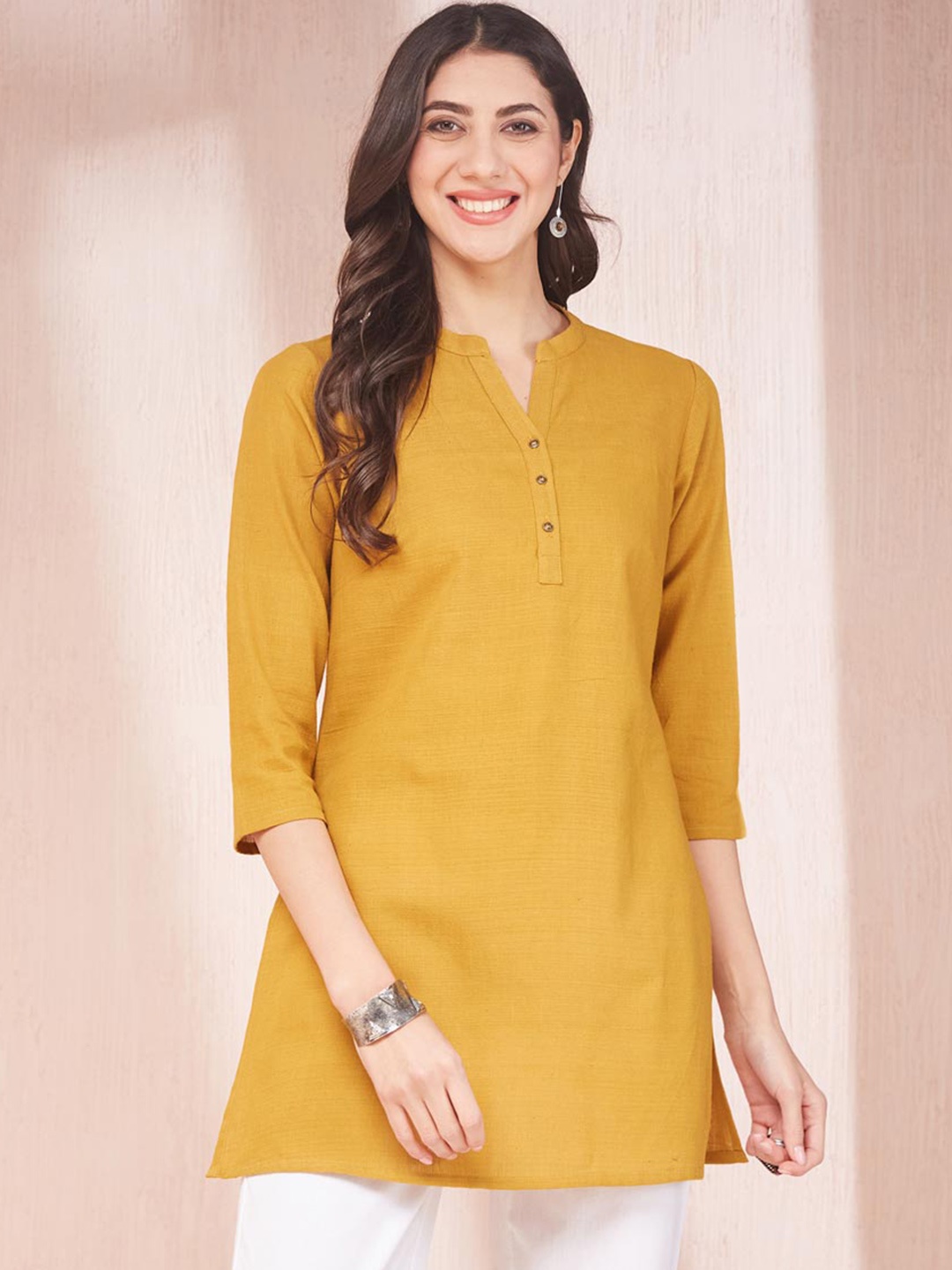 

Fabindia Women Solid V Neck Slim Fit Kurta, Mustard