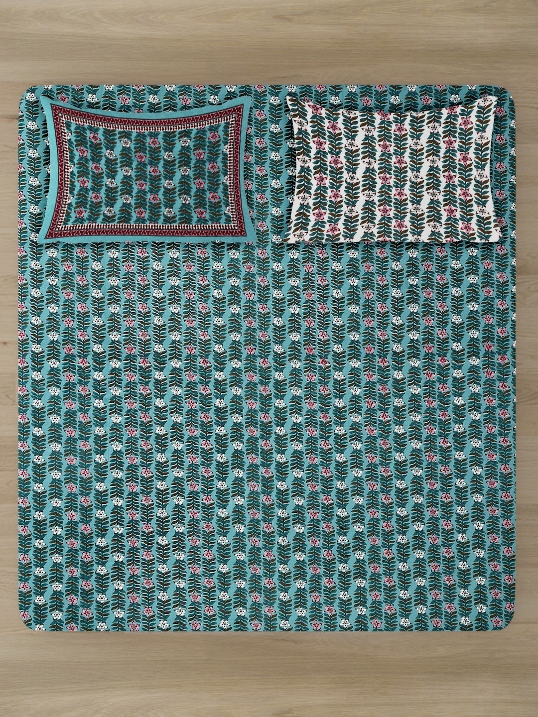 

Rajasthan Decor Sea Green & White Floral 180 TC King Bedsheet with 2 Pillow Covers