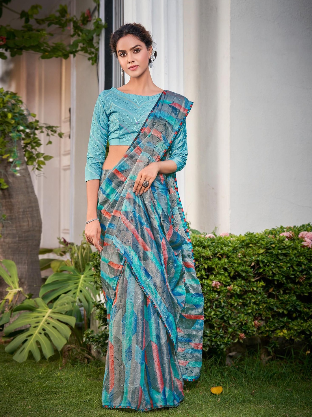 

Mitera Embroidered Brasso Saree, Turquoise blue