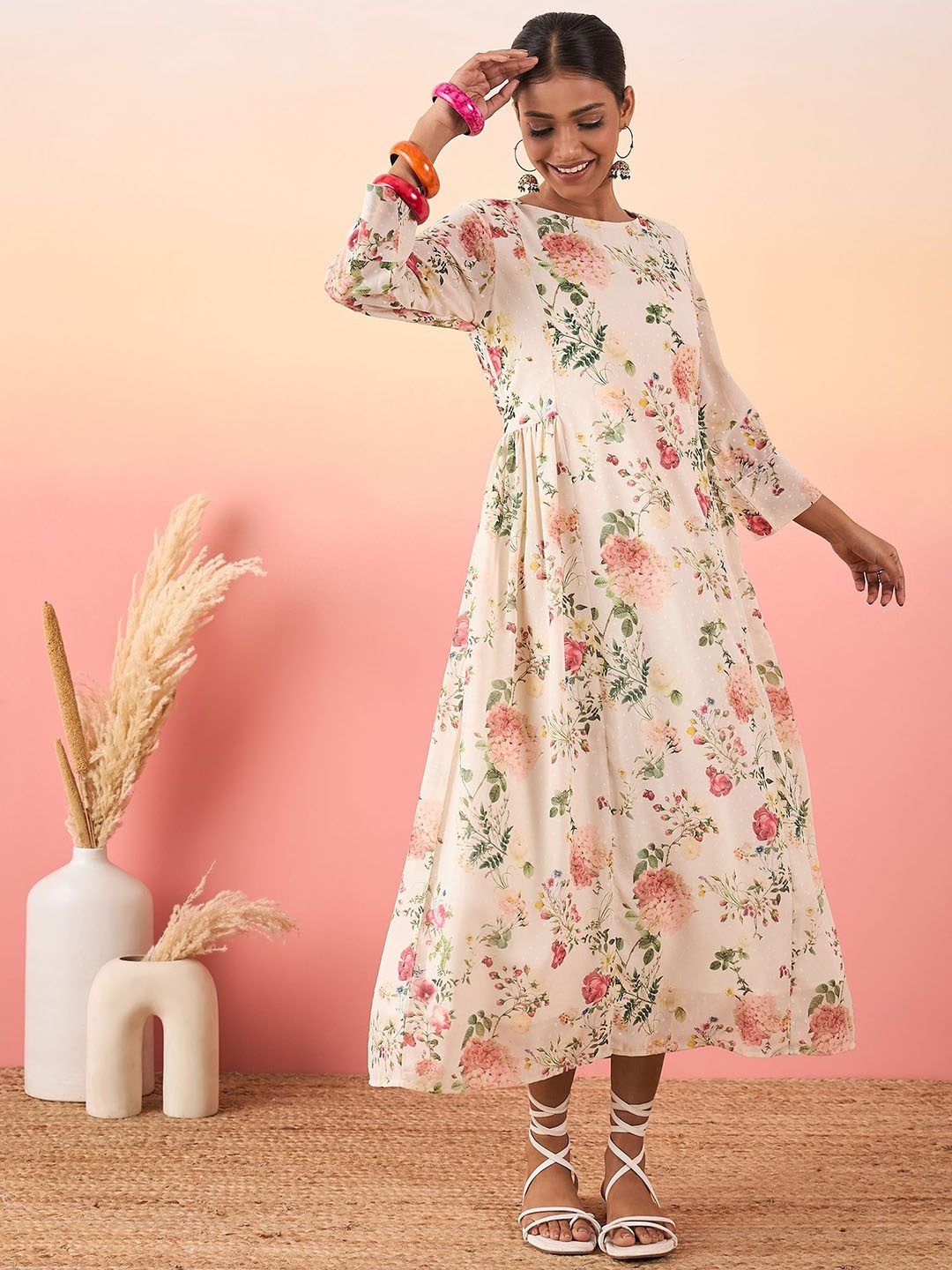 

Madhuni Floral Printed Boat Neck Beads and Stones Empire Georgette A-Line Kurta, Cream