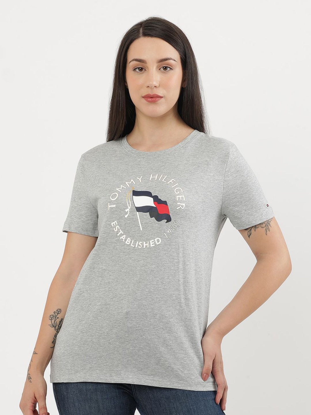 

Tommy Hilfiger Women Solid Typography V-Neck Applique T-shirt, Grey
