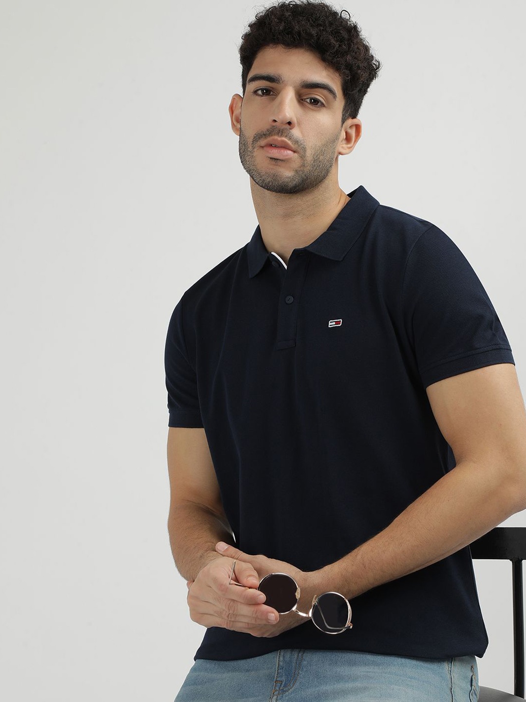 

Tommy Hilfiger Men Solid Polo Collar Applique Slim Fit T-shirt, Blue