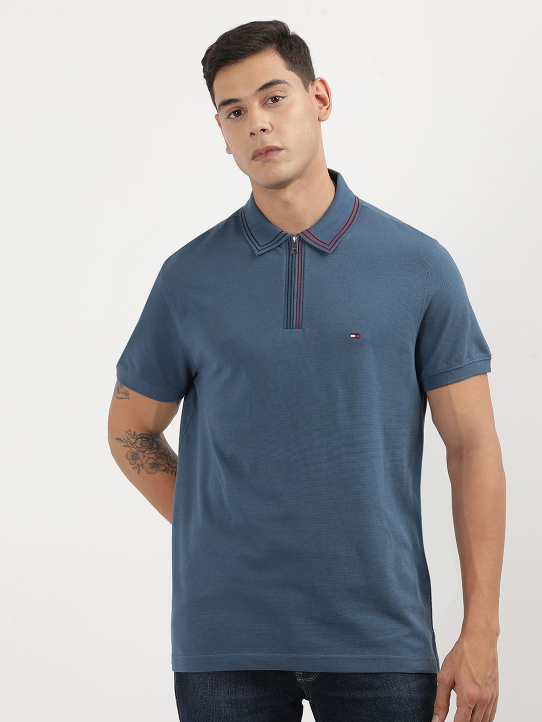 

Tommy Hilfiger Men Solid Mandarin Collar Pockets T-shirt, Blue